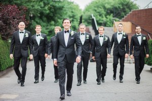 groomsmen walking on battery park photos