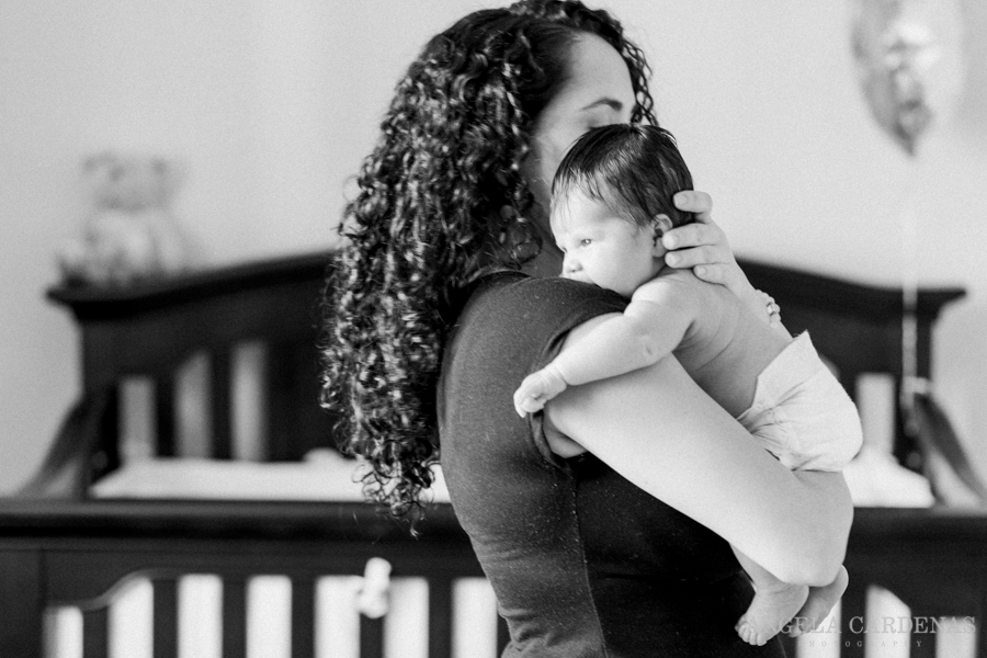 black and white photo mom holding baby girl